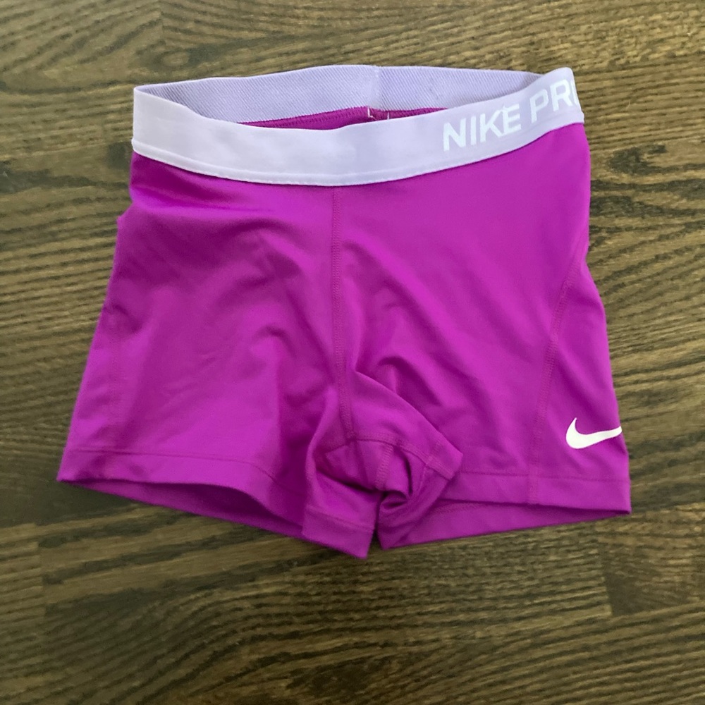 DISCONNECTED size small nike pros in a purple pink color 💗💜